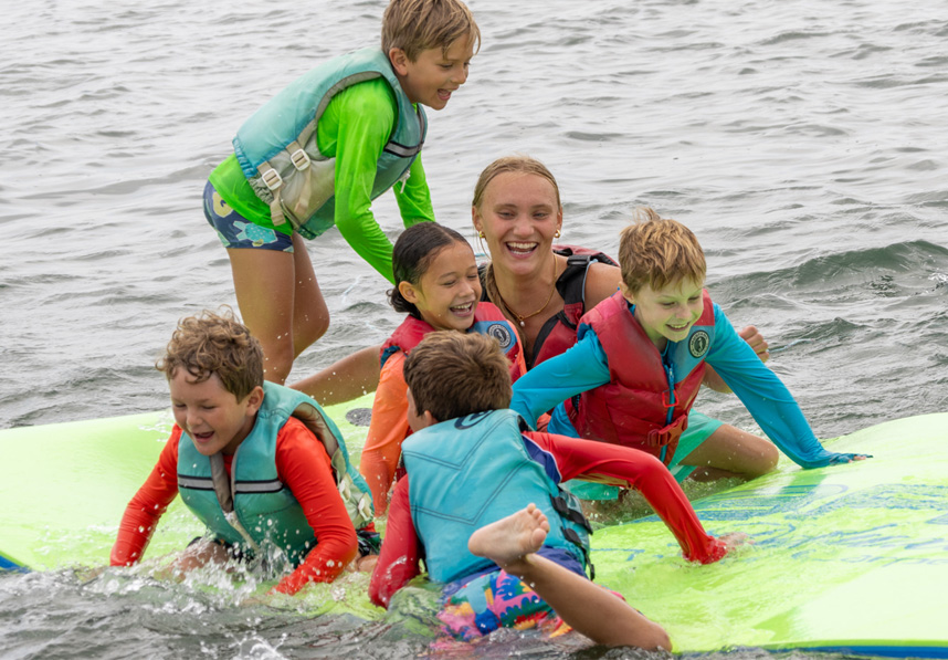 Kids and counselor on the lilypad